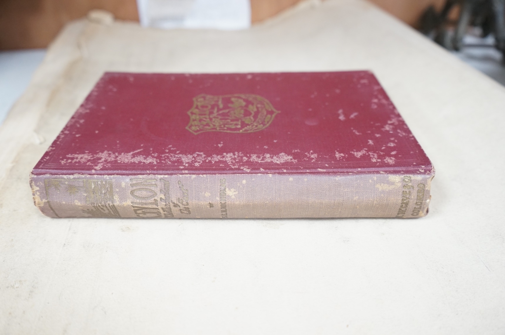 Nicholas, S.E.N. - A Handbook of Ceylon: 'The Wonderland of the East'. portrait, coloured and other plates, coloured folded maps, other maps and text illus.; original gilt pictorial cloth. Colombo: H.W. Cave & Co., 1939.